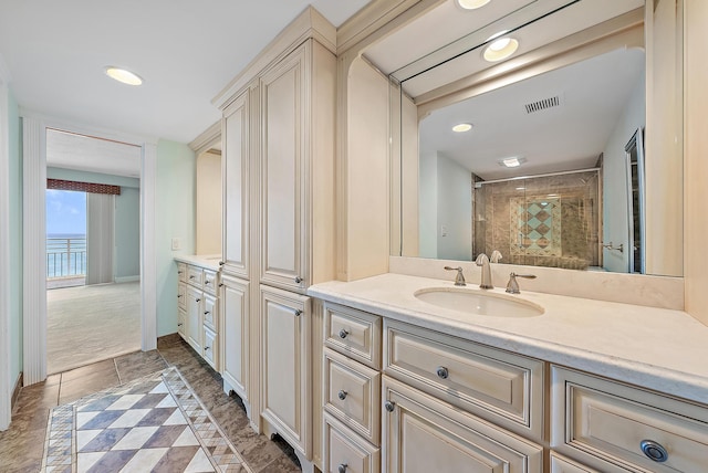 350 Beach Rd Unit 503, Tequesta, FL 33469 - bathroom with vanity, tiled shower, and recessed lighting