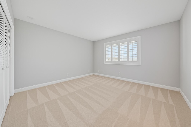 350 Beach Rd Unit 503, Tequesta, FL 33469 - unfurnished bedroom with baseboards, carpet, and a closet