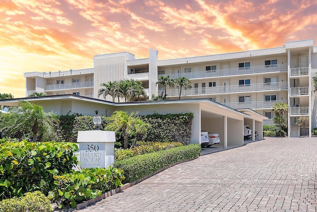350 Beach Rd Unit 503, Tequesta, FL 33469 - property at dusk with covered parking