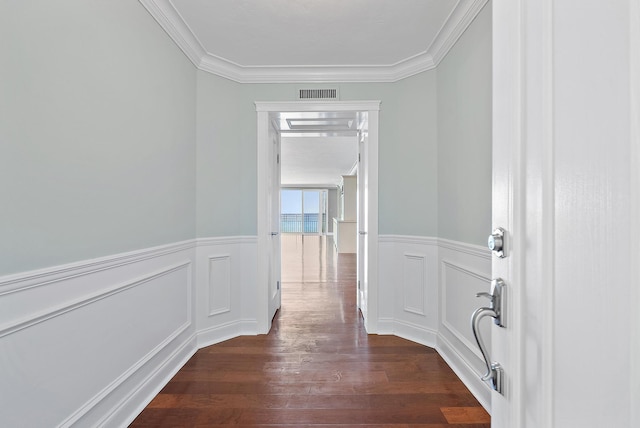 350 Beach Rd Unit 503, Tequesta, FL 33469 - hallway featuring ornamental molding, dark wood finished floors, and a wainscoted wall