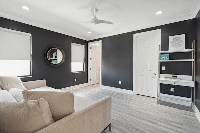 living room with light wood finished floors, baseboards, ceiling fan, ornamental molding, and recessed lighting