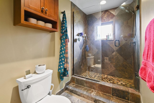 11151 88th Rd N, Palm Beach Gardens, FL 33412 - bathroom featuring toilet and a stall shower