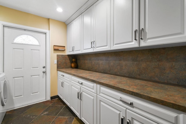 11151 88th Rd N, Palm Beach Gardens, FL 33412 - laundry area featuring cabinet space, stone tile flooring, and recessed lighting