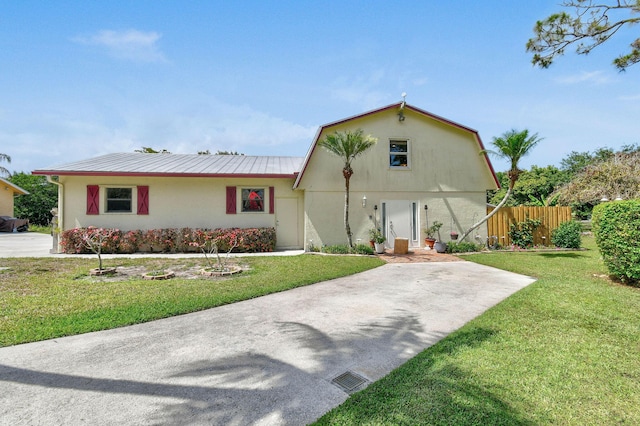 11151 88th Rd N, Palm Beach Gardens, FL 33412 - view of front of house with metal roof and stucco siding