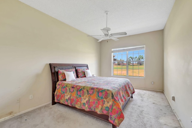 bedroom with carpet floors, baseboards, and ceiling fan