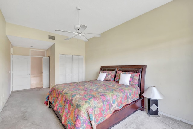 carpeted bedroom with a closet and a ceiling fan