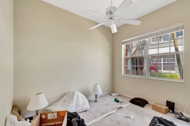 bedroom with carpet floors, baseboards, and ceiling fan