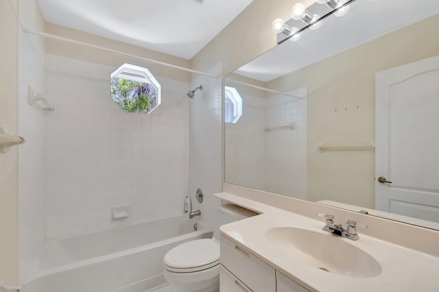 bathroom with toilet, vanity, and shower / bath combination