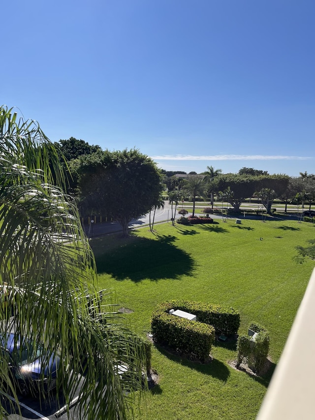 4047 Ainslie C, Boca Raton, FL 33434 - view of home's community with a lawn