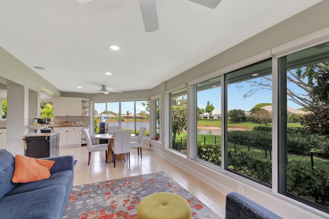 5 Slash Pine Dr, Boynton Beach, FL 33436 - sunroom with tile patterned floors, a water view, and recessed lighting