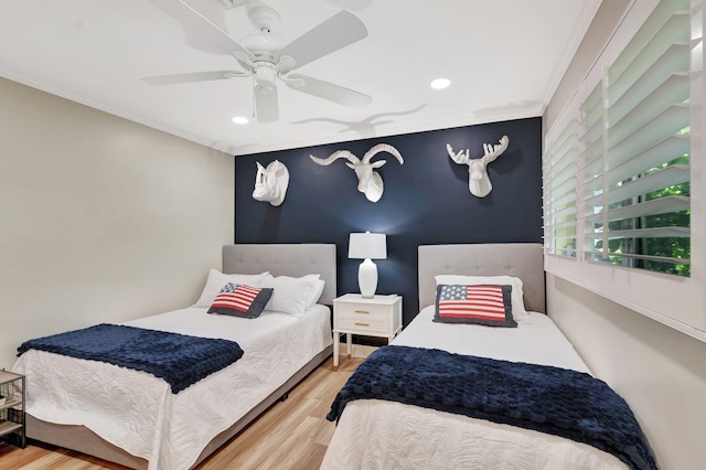 5 Slash Pine Dr, Boynton Beach, FL 33436 - bedroom featuring recessed lighting, wood finished floors, crown molding, a ceiling fan, and an accent wall