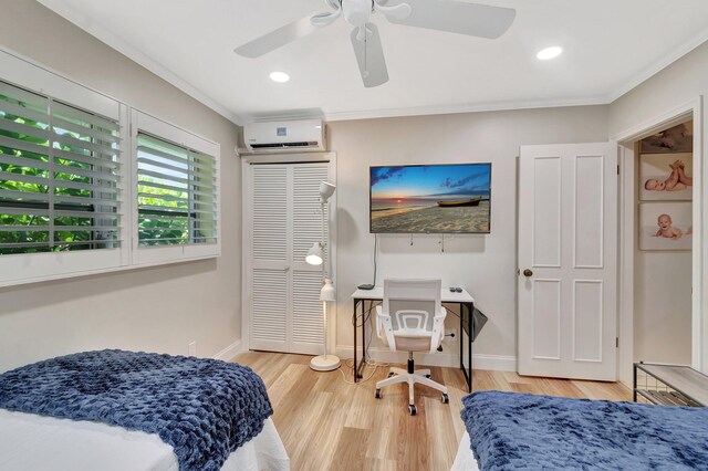 5 Slash Pine Dr, Boynton Beach, FL 33436 - bedroom with a wall unit AC, ornamental molding, wood finished floors, ceiling fan, and baseboards