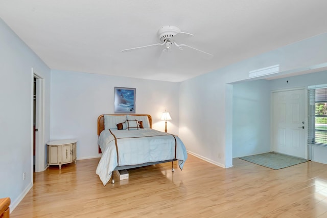 410 High Point Dr Unit C, Delray Beach, FL 33445 - bedroom with light wood-style flooring, baseboards, and ceiling fan