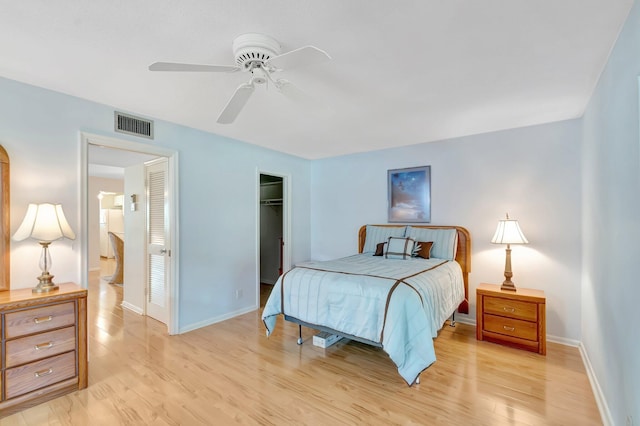 410 High Point Dr Unit C, Delray Beach, FL 33445 - bedroom featuring light wood-style floors, baseboards, a closet, and a ceiling fan
