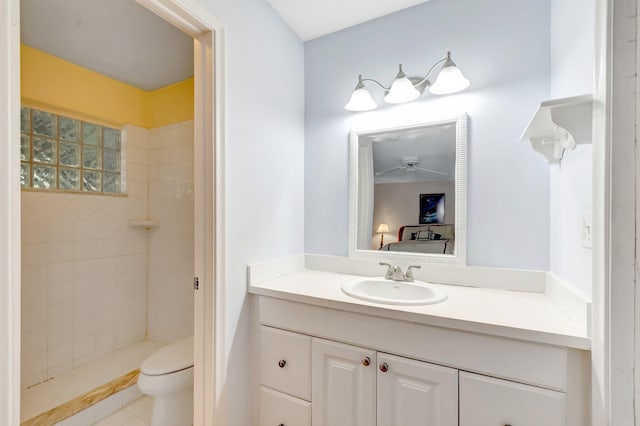 410 High Point Dr Unit C, Delray Beach, FL 33445 - full bath featuring vanity, toilet, a tile shower, and connected bathroom