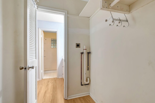 410 High Point Dr Unit C, Delray Beach, FL 33445 - corridor featuring light wood-style floors and baseboards