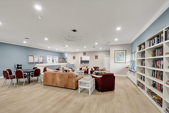 410 High Point Dr Unit C, Delray Beach, FL 33445 - living room with crown molding, light wood finished floors, recessed lighting, a ceiling fan, and baseboards