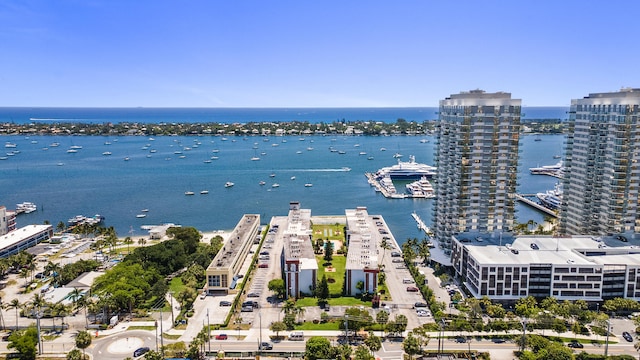view of urban area with a large body of water