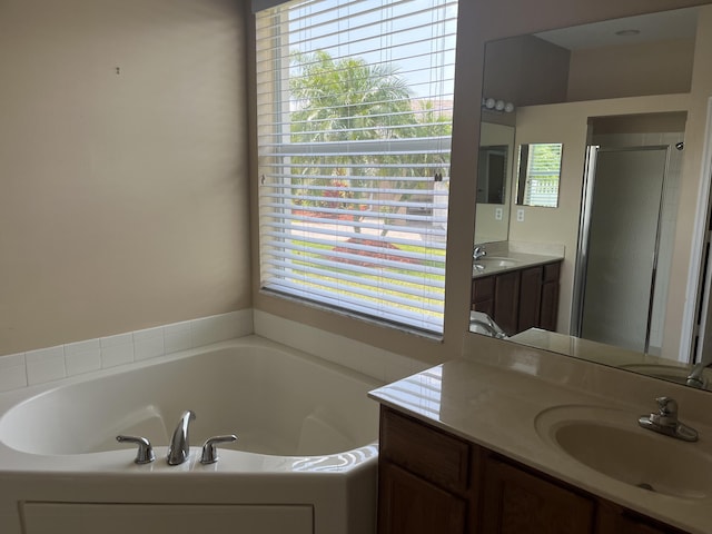 6110 46th Ln, Vero Beach, FL 32967 - full bath with a bath, vanity, and a stall shower