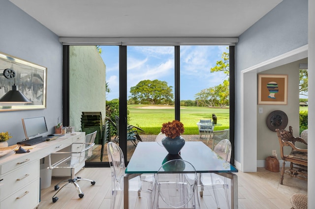 730 Greensward Ct Unit 107-J, Delray Beach, FL 33445 - sunroom / solarium featuring view of golf course and plenty of natural light