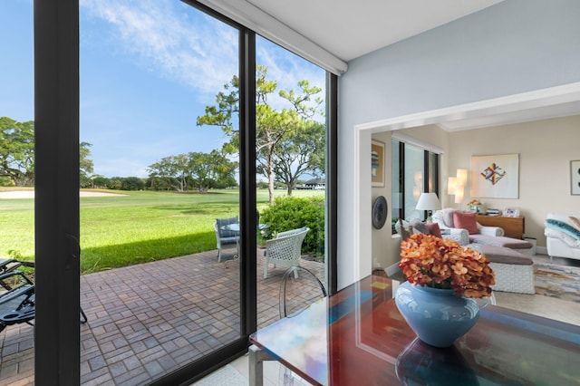 730 Greensward Ct Unit 107-J, Delray Beach, FL 33445 - sunroom / solarium with golf course view and healthy amount of natural light
