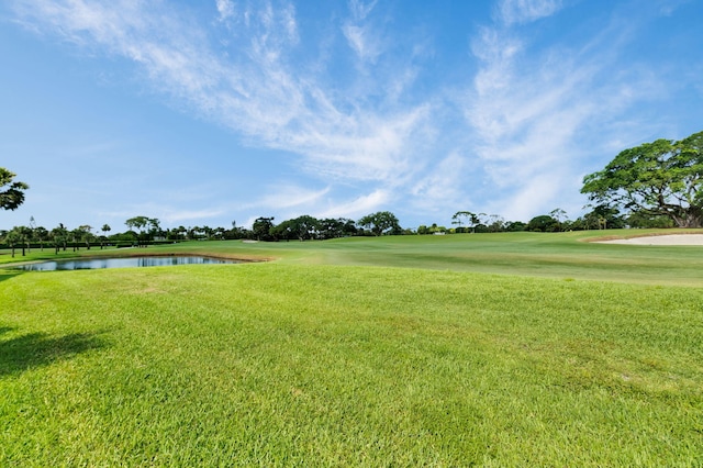 730 Greensward Ct Unit 107-J, Delray Beach, FL 33445 - view of property's community with a yard, a water view, and view of golf course