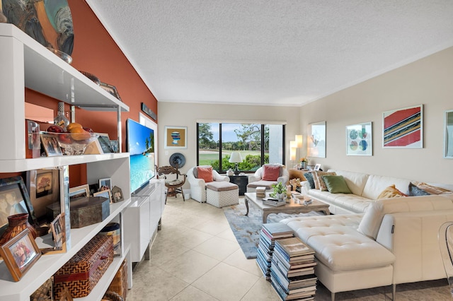 730 Greensward Ct Unit 107-J, Delray Beach, FL 33445 - living area with a textured ceiling and light tile patterned floors