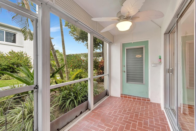 2161 NE 42nd Ct Unit 116, Lighthouse Point, FL 33064 - unfurnished sunroom with ceiling fan