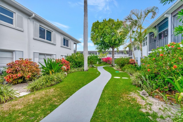 2161 NE 42nd Ct Unit 116, Lighthouse Point, FL 33064 - view of property's community featuring a lawn