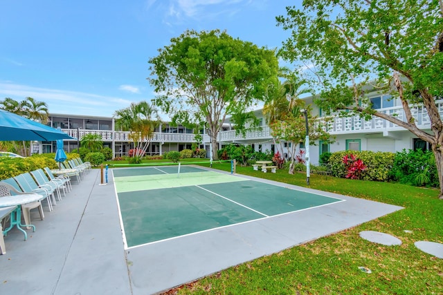 2161 NE 42nd Ct Unit 116, Lighthouse Point, FL 33064 - view of home's community featuring a tennis court and a lawn