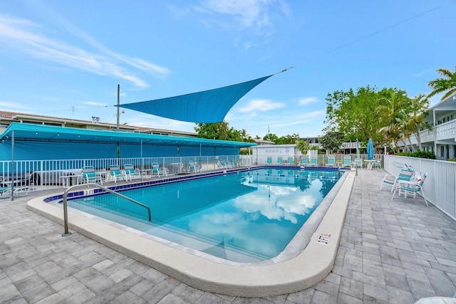2161 NE 42nd Ct Unit 116, Lighthouse Point, FL 33064 - community pool featuring a patio area