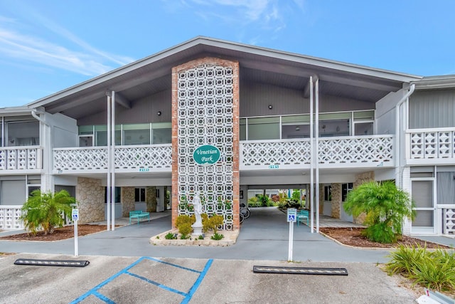 2161 NE 42nd Ct Unit 116, Lighthouse Point, FL 33064 - view of property with a carport