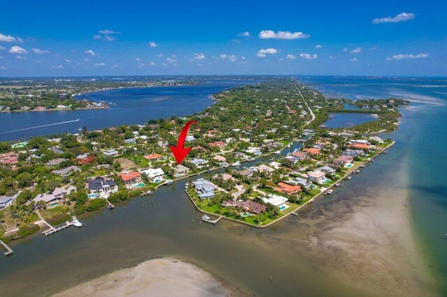16 E High Point Rd, Sewalls Point, FL 34996 - aerial overview of property's location featuring a large body of water and nearby suburban area