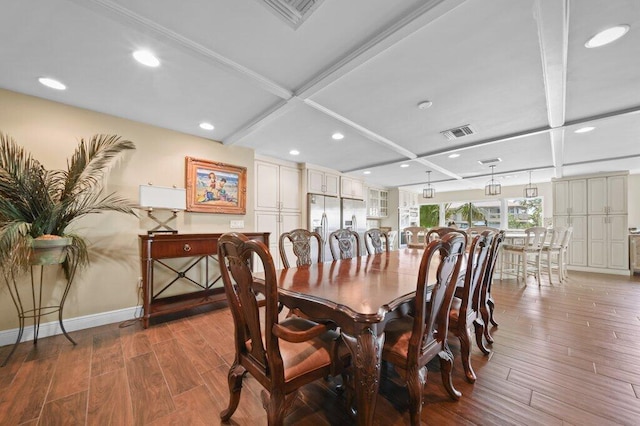 16 E High Point Rd, Sewalls Point, FL 34996 - dining room with coffered ceiling, wood finished floors, recessed lighting, and beam ceiling