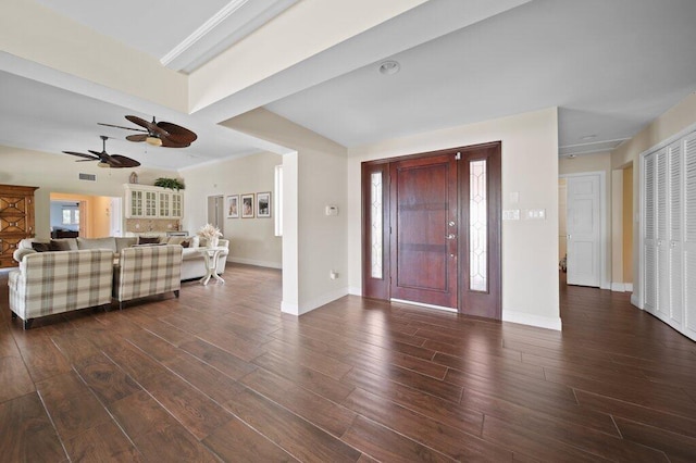 16 E High Point Rd, Sewalls Point, FL 34996 - foyer entrance with ceiling fan and dark wood finished floors