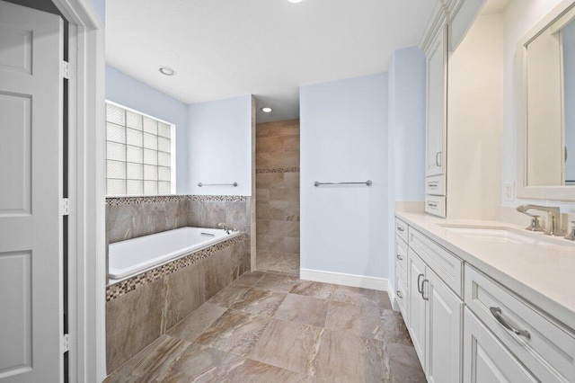 16 E High Point Rd, Sewalls Point, FL 34996 - full bath with vanity, a bath, a walk in shower, and recessed lighting