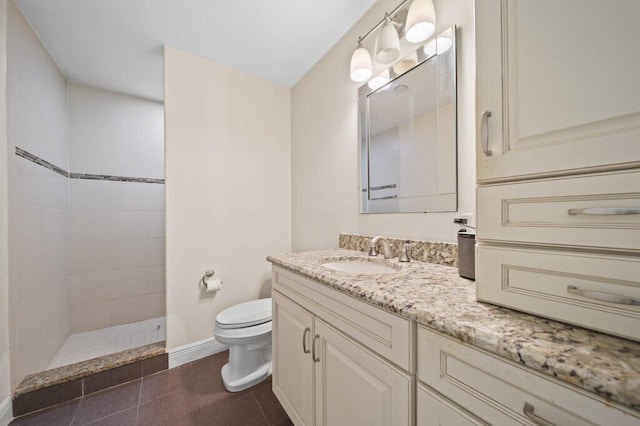 16 E High Point Rd, Sewalls Point, FL 34996 - full bathroom featuring vanity, a tile shower, and tile patterned flooring