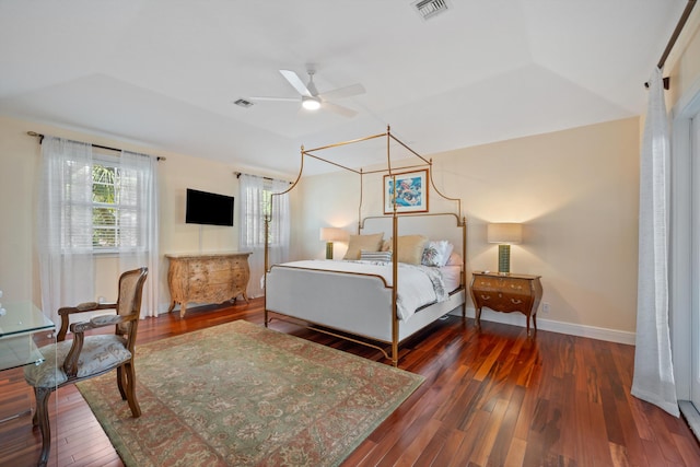 2 Firestone Cir, West Palm Beach, FL 33401 - bedroom featuring multiple windows, hardwood / wood-style flooring, and baseboards
