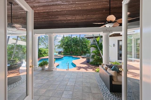 2 Firestone Cir, West Palm Beach, FL 33401 - view of pool featuring ceiling fan, a pool with connected hot tub, and a patio area