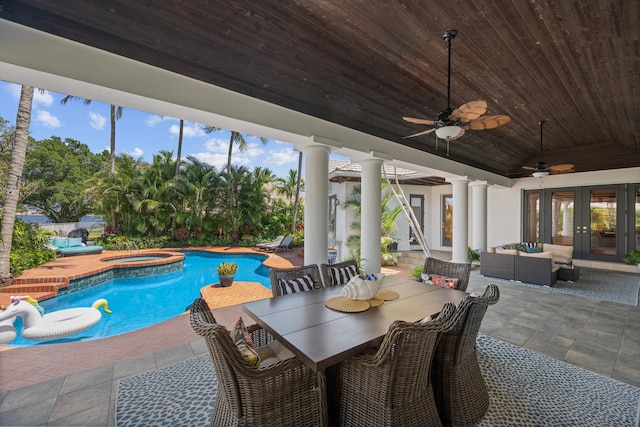 2 Firestone Cir, West Palm Beach, FL 33401 - view of pool with french doors, an outdoor hangout area, a patio area, outdoor dining space, and a ceiling fan