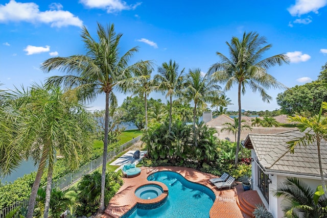 2 Firestone Cir, West Palm Beach, FL 33401 - view of pool featuring a fenced backyard and a pool with connected hot tub