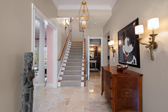 2 Firestone Cir, West Palm Beach, FL 33401 - entryway with stairs, ornate columns, crown molding, light marble finish floors, and baseboards