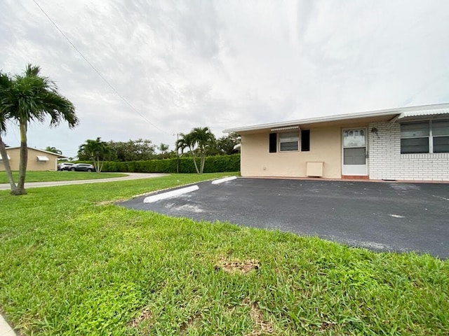 2715 Ponce De Leon Blvd, Delray Beach, FL 33445 - view of grassy yard