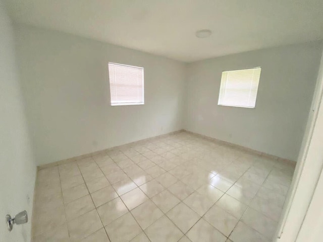 2715 Ponce De Leon Blvd, Delray Beach, FL 33445 - spare room with light tile patterned floors
