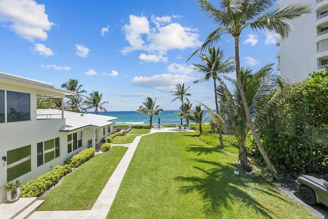 3401 S Ocean Blvd Unit 6, Highland Beach, FL 33487 - view of green lawn featuring a water view