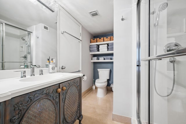 1627 Riverview Rd Unit 409, Deerfield Beach, FL 33441 - bathroom with toilet, a stall shower, baseboards, vanity, and tile patterned floors