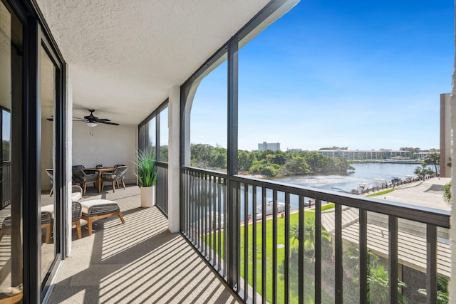 1627 Riverview Rd Unit 409, Deerfield Beach, FL 33441 - balcony featuring a water view and ceiling fan