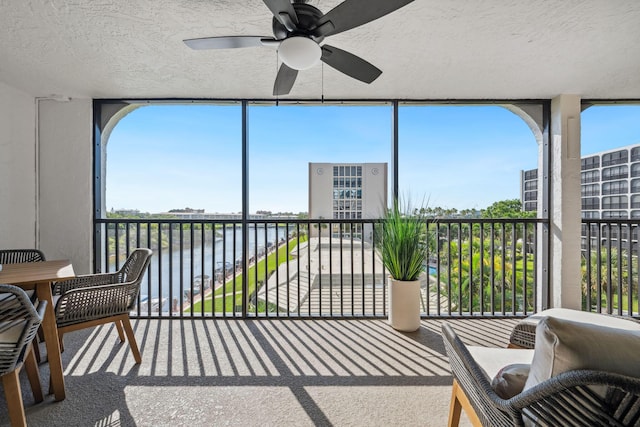 1627 Riverview Rd Unit 409, Deerfield Beach, FL 33441 - sunroom / solarium with a water view and a ceiling fan