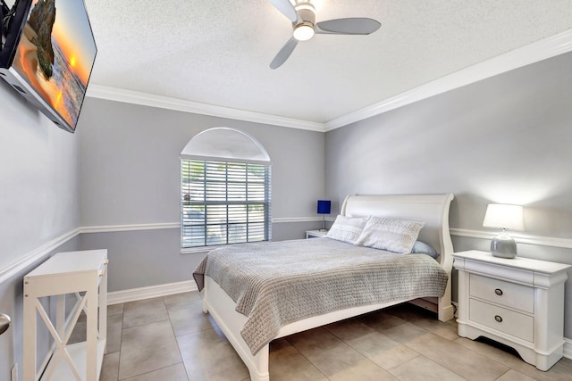 1833 Barnstable Rd, Wellington, FL 33414 - tiled bedroom with ornamental molding, a textured ceiling, ceiling fan, and baseboards