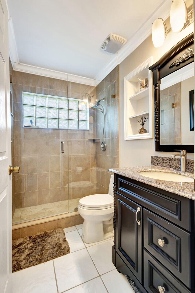 1833 Barnstable Rd, Wellington, FL 33414 - bathroom with vanity, ornamental molding, a shower stall, tile patterned flooring, and toilet